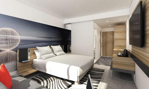 Habitación Superior Queen con sofá del hotel Novotel London Waterloo. Foto 10