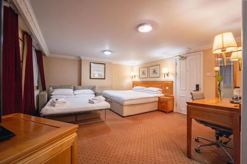 Habitación Triple del hotel Grange Buckingham. Foto 5