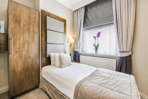 Habitación Individual del hotel Gem Langham Court. Foto 1