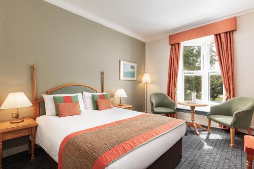 Habitación Doble Estándar con vistas al jardín del hotel Coulsdon Manor and Golf Club. Foto 7