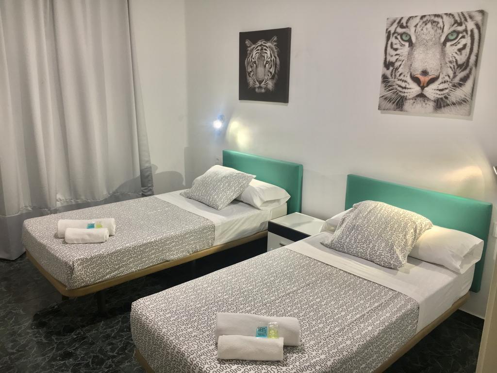 Habitación doble 2 camas del hotel Camp Nou Home. Foto 1