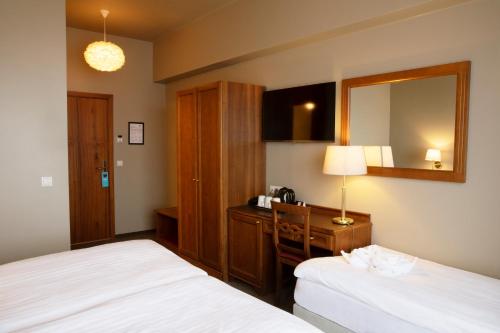 Habitación Triple del hotel Fosshotel Stykkisholmur. Foto 3