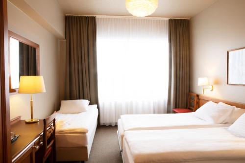Habitación Triple del hotel Fosshotel Stykkisholmur. Foto 4
