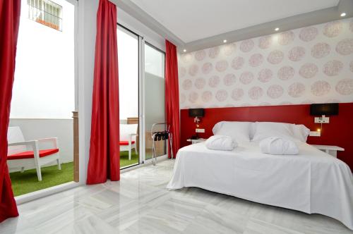 Estudio con balcón del hotel The Zentral Arenal Suites. Foto 1