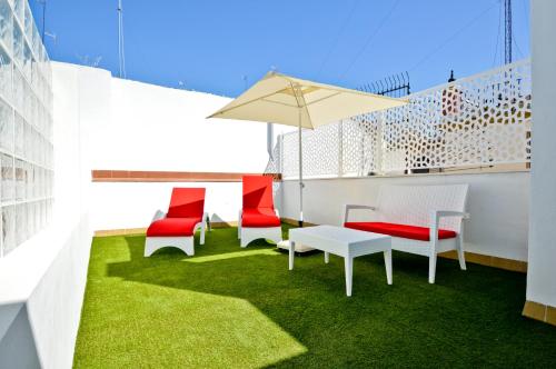 Estudio ático con terraza privada del hotel The Zentral Arenal Suites. Foto 4