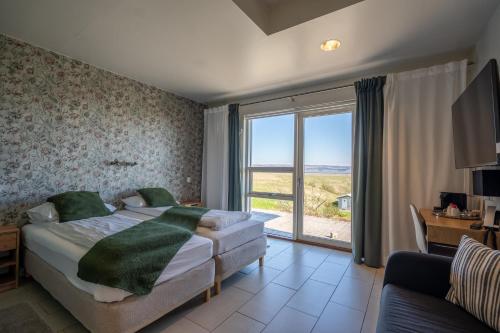 Habitación Doble Deluxe con vistas a la montaña - 1 o 2 camas del hotel Laki. Foto 1