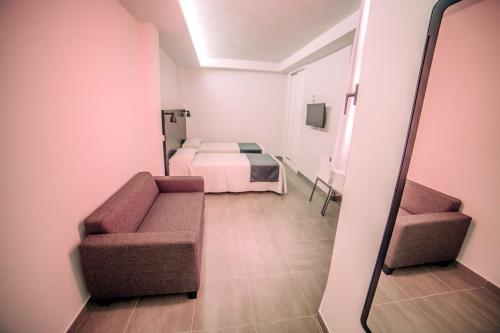 Estudio interior del hotel Mannix Urban Apartments. Foto 1