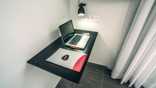 Apartamento Ático de 1 dormitorio con terraza del hotel Mannix Urban Apartments. Foto 7