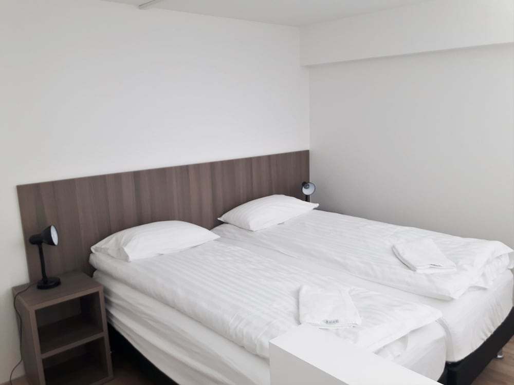 Habitación con 1 cama doble o 2 individuales del hotel Milk Factory. Foto 6