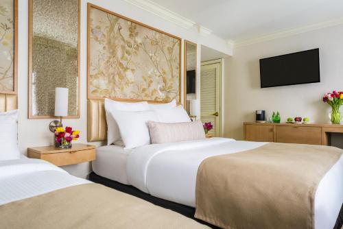 Habitación con 2 camas grandes del hotel Warwick Allerton - Chicago. Foto 1