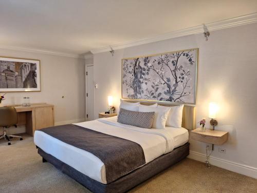 Habitación con cama extragrande. del hotel Warwick Allerton - Chicago. Foto 8