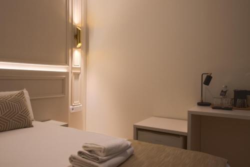 Habitación Triple Estándar del hotel Le Petit Palü-fuencarral. Foto 1