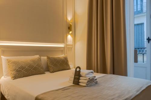 Habitación doble con balcón del hotel Le Petit Palü-fuencarral