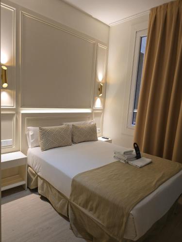 Habitación Doble Deluxe con cama supletoria del hotel Le Petit Palü-fuencarral. Foto 2