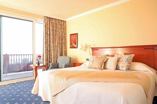 Suite con vistas al mar - Cama extragrande del hotel Casa Leon