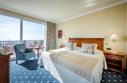 Suite con vistas al mar - Cama extragrande del hotel Casa Leon. Foto 1