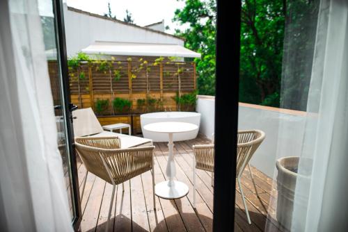 Habitación Prémium con bañera exterior, terraza y vistas al Real Alcázar del hotel Legado Alcázar. Foto 6