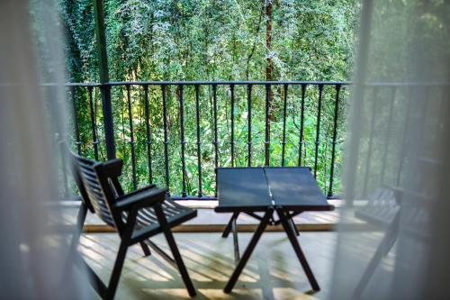 Habitación Deluxe con terraza y vistas al Real Alcázar del hotel Legado Alcázar