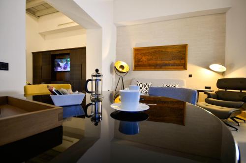 Suite con terraza y vistas al Real Alcázar del hotel Legado Alcázar. Foto 8