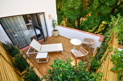Habitación Doble Superior con terraza y vistas al Real Alcázar del hotel Legado Alcázar