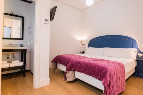 Habitación Doble Estándar - 2 camas del hotel Cicerone De Sevilla. Foto 3