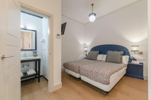 Habitación Doble Estándar - 2 camas del hotel Cicerone De Sevilla. Foto 6