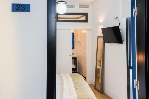 Habitación Doble Económica del hotel Cicerone De Sevilla. Foto 3