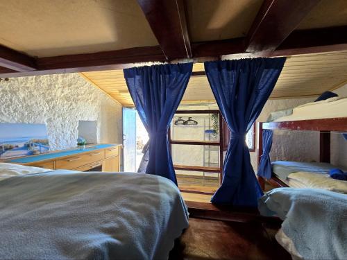 Cama en habitación compartida de 6 camas del hotel Mountain Finca La Isa