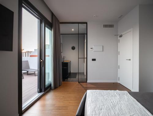 Ático con terraza del hotel Welldone Antiquarium. Foto 2