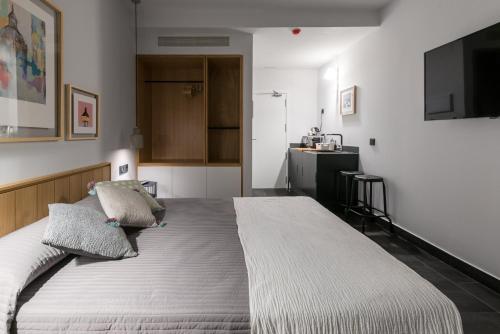 Habitación Doble con jardín del hotel Welldone Antiquarium. Foto 2