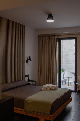 Habitación Doble con jardín del hotel Welldone Antiquarium. Foto 5