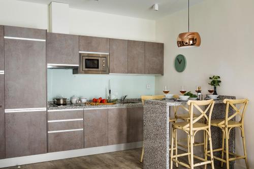 Apartamento Superior Con Cocina 1 Cama queen 1 habitación Con Vistas Sofá Cama incluido del hotel Matahacas Pool & Luxury. Foto 3