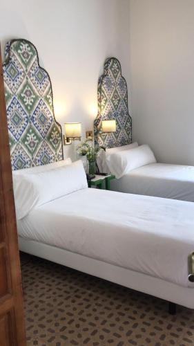 Habitación Doble Estándar del hotel Santiago 15 Casa Palacio. Foto 1