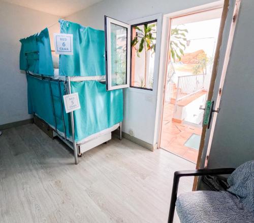 Litera en habitación compartida - Solo mujeres del hotel Puerto Nest