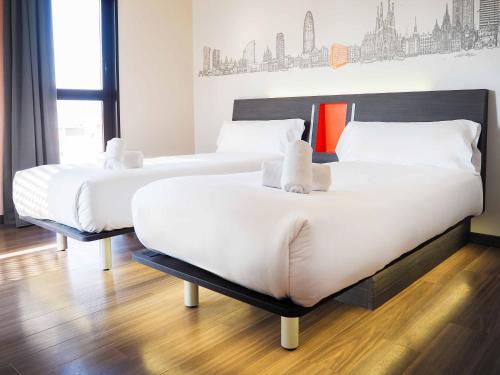 Habitación Doble - 2 camas del hotel Easyhotel Barcelona Fira. Foto 5