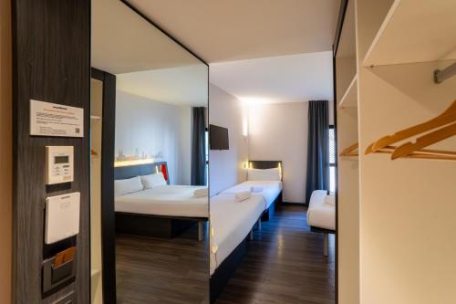 Habitación Familiar del hotel Easyhotel Barcelona Fira. Foto 9