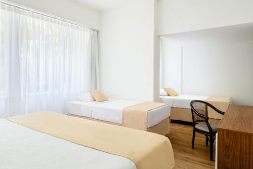 Habitación Familiar Superior del hotel Savoy Othon. Foto 1