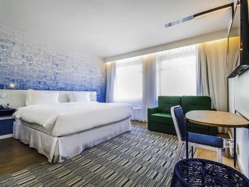 Habitación Familiar Superior del hotel Novotel Rio De Janeiro Leme. Foto 3