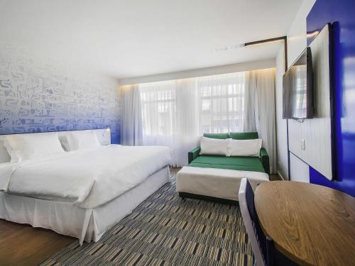 Habitación Familiar Superior del hotel Novotel Rio De Janeiro Leme. Foto 5