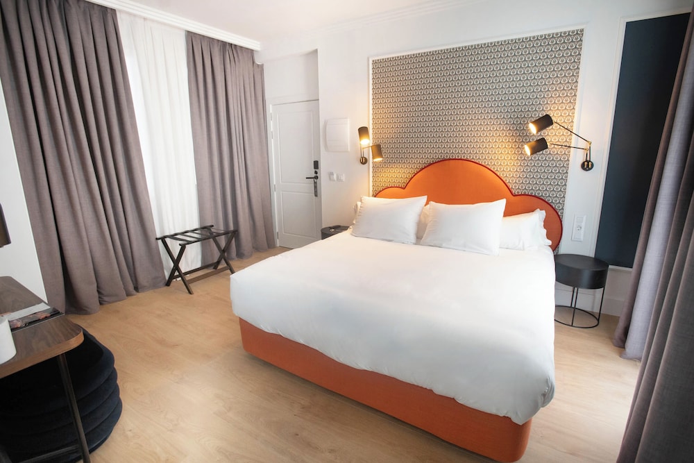 Habitación con 1 cama doble o 2 individuales del hotel Soho Boutique Opera. Foto 3