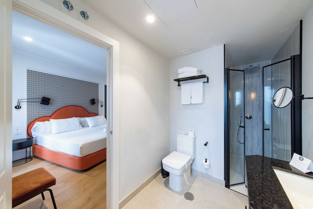 Habitación Triple del hotel Soho Boutique Opera. Foto 6