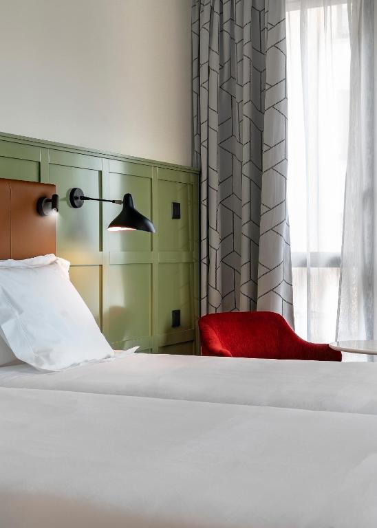 Habitación doble Comunicada del hotel Vincci Consulado De Bilbao. Foto 1