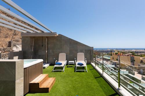 Superior de 1 dormitorio con bañera de hidromasaje del hotel Cordial Mogán Solaz. Foto 10