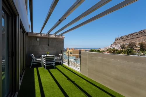 Superior de 1 dormitorio con bañera de hidromasaje del hotel Cordial Mogán Solaz. Foto 17