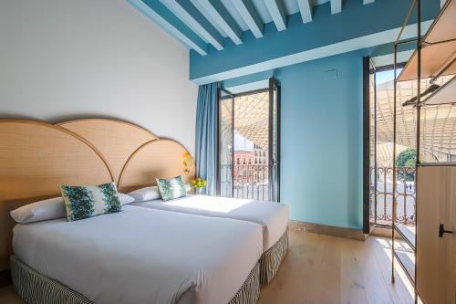 Habitación Doble Superior con vistas a la ciudad - 1 o 2 camas del hotel Intelier Casa De Indias. Foto 8