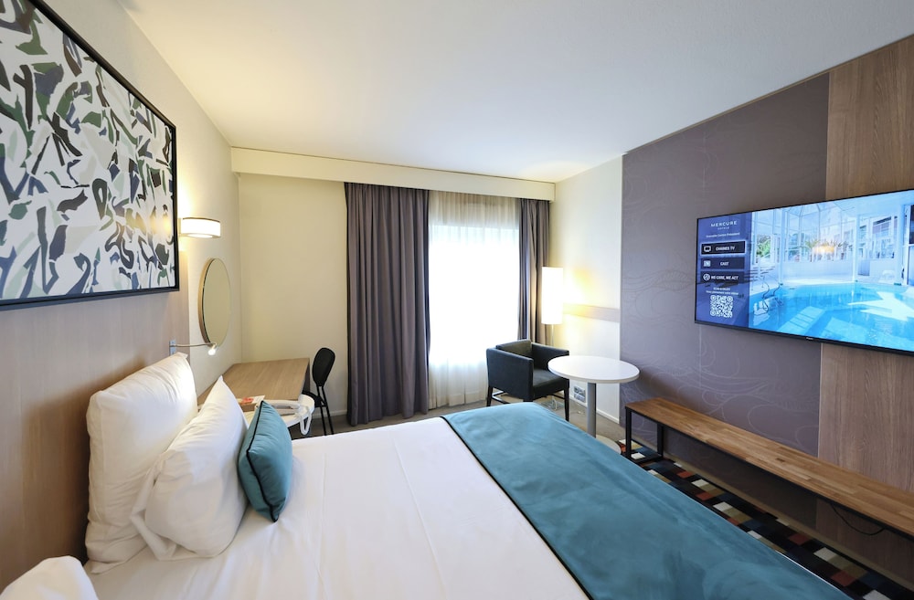Habitación con cama Queen del hotel Mercure Grenoble Centre President. Foto 1