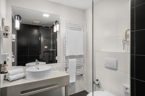 Habitación Estándar - 1 o 2 camas del hotel Akeah Verdi Budapest. Foto 3