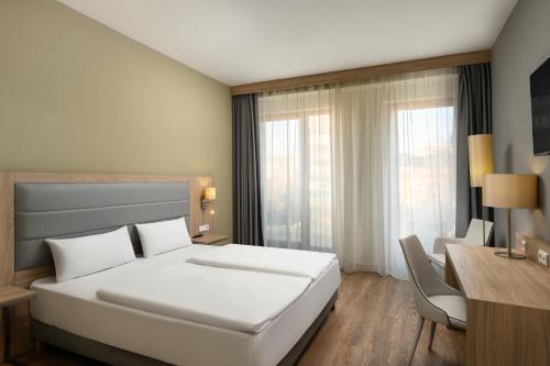 Habitación Doble Deluxe - 1 o 2 camas del hotel Akeah Verdi Budapest. Foto 2