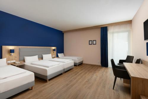 Habitación Familiar del hotel Akeah Verdi Budapest. Foto 1