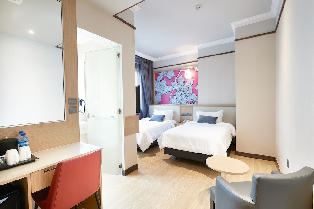 Habitación ejecutiva con 2 camas individuales del hotel Bencoolen@hong Kong Street. Foto 1